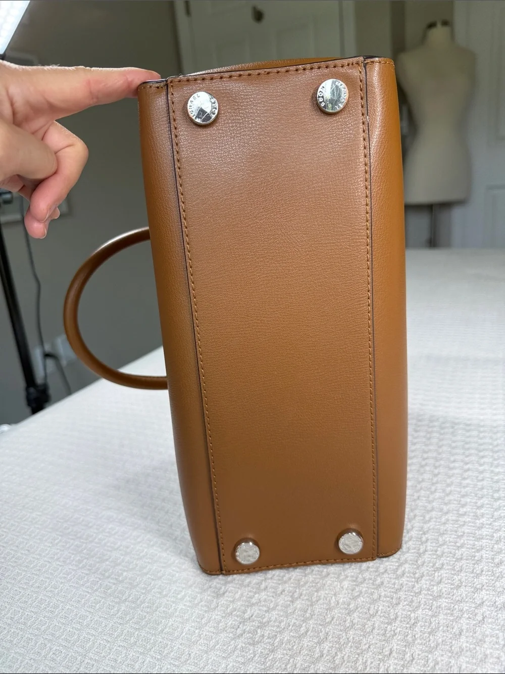 Michael Kors saddle tan saffiano leather satchel with silver hardware